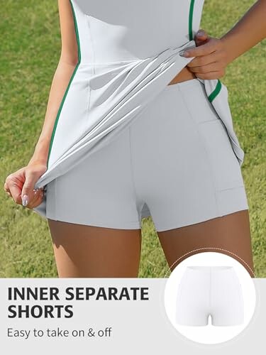 Woman wearing a sports outfit showing inner separate shorts.