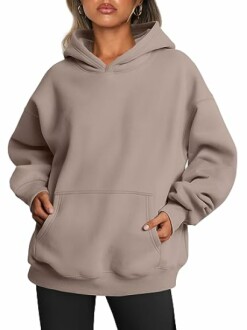 Woman wearing a beige hoodie