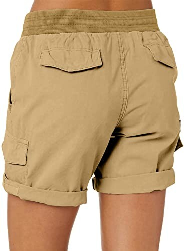Back view of khaki cargo shorts with pockets.