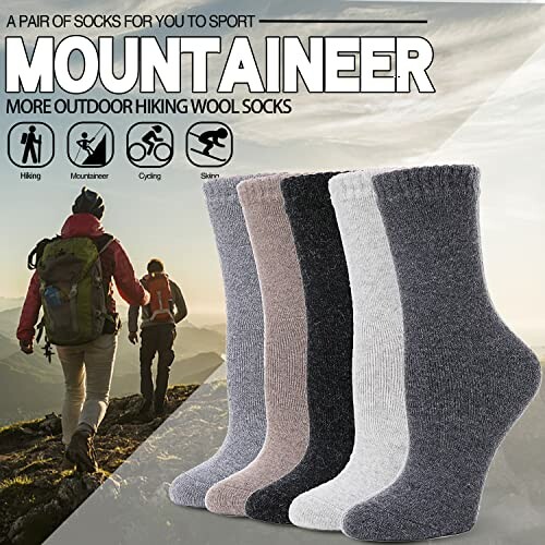 Various colors of hiking wool socks with mountain background and hikers.