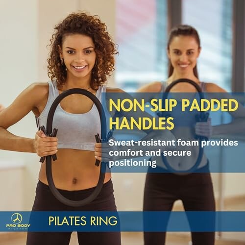 Two women holding pilates rings with non-slip padded handles.