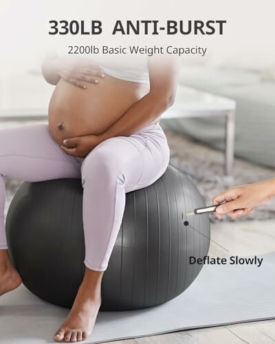 Pregnant woman sitting on an exercise ball with deflation feature.
