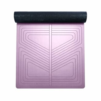 Purple yoga mat with alignment lines