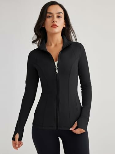 Woman wearing a black zip-up jacket