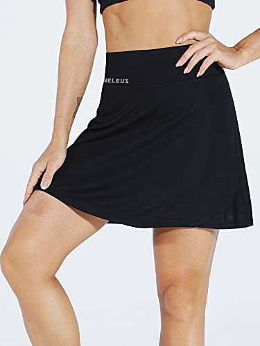 Woman wearing a black athletic skirt and top