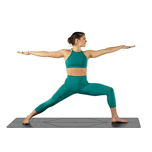 Woman in yoga pose on mat